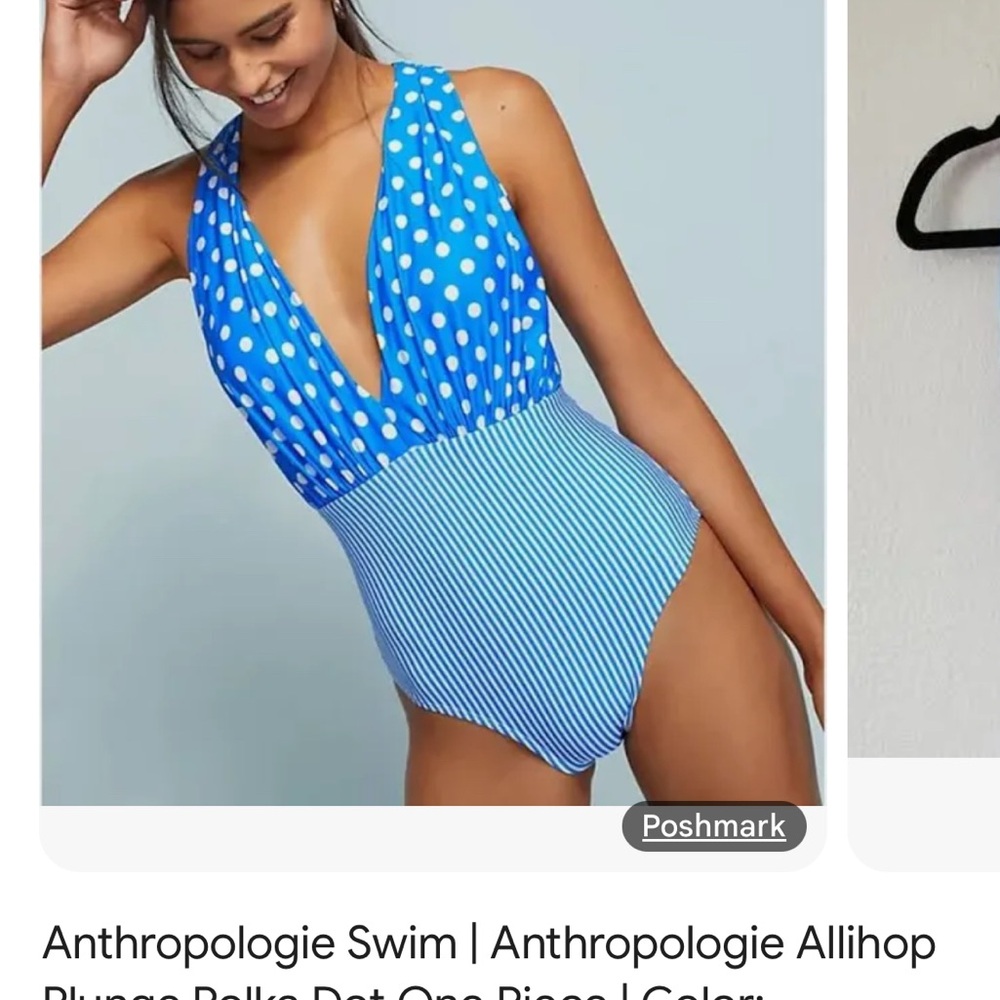 Anthropologie Never worn swimsuit with tags. Navy blue.
